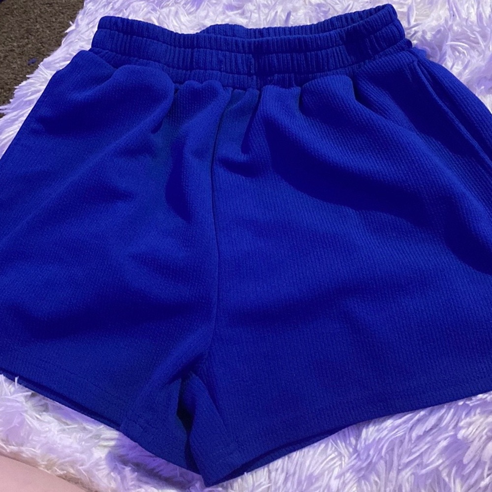 Worn dark blue shorts